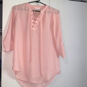 Quarter length pink blouse